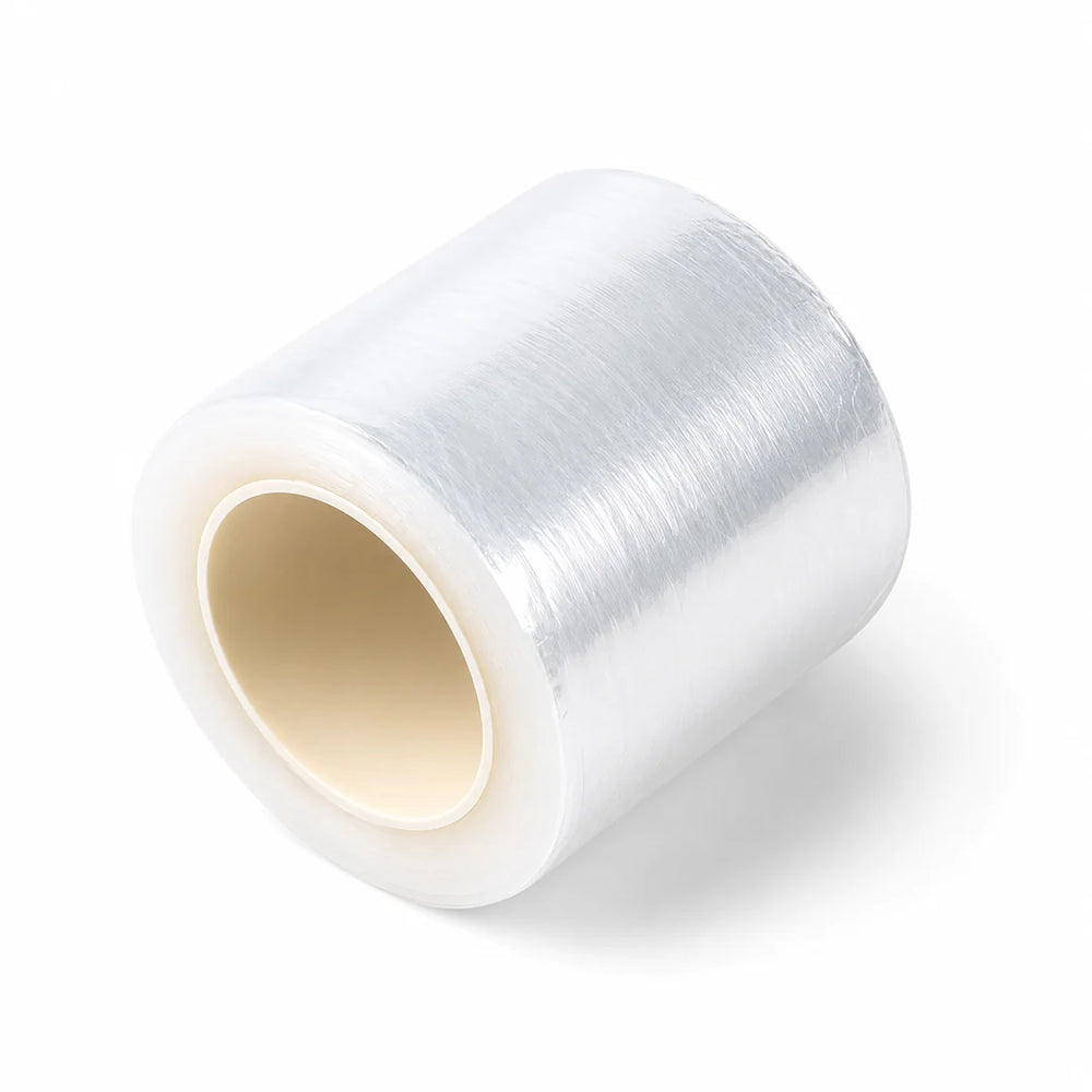 Cling wrap for eyelash removals and lash lifts, 42 mm × 200 m clear film with cutter box for professional lash artists and salon treatments.