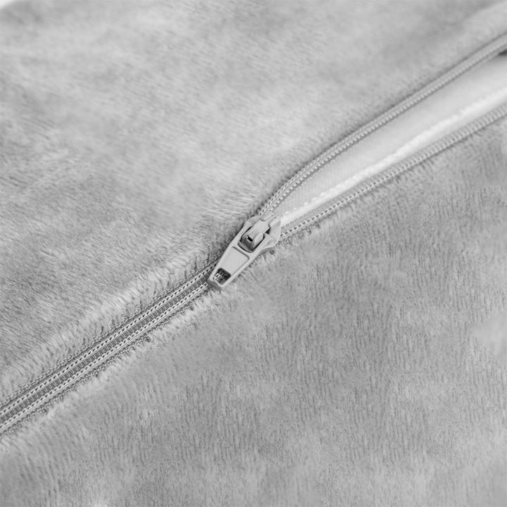 Ergonomic lash pillow with plush velvet cover, zero-pressure support, dual side pockets for tools, holds head steady at ideal working angle.