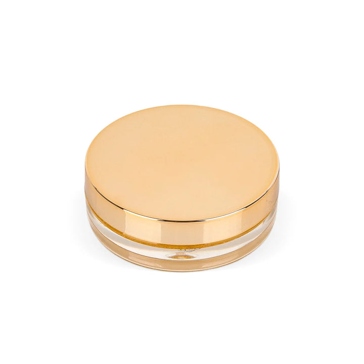 Open jar of Korean Lash Lift Glue Balm with a gold-colored lid, Super Sticky unscented version for professional lash placement.