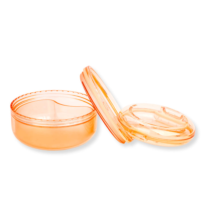 Black and apricot lash lift shield storage and cleaning cases with translucent round bodies and removable lids.