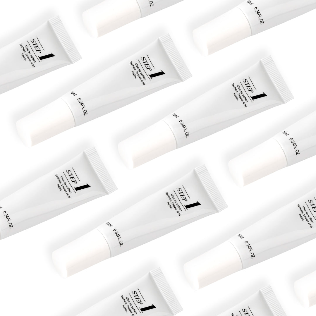 Professional lash lift treatment kit with Step 1 and Step 2 system for lifting, curling, and setting natural lashes and brows in salon use.
