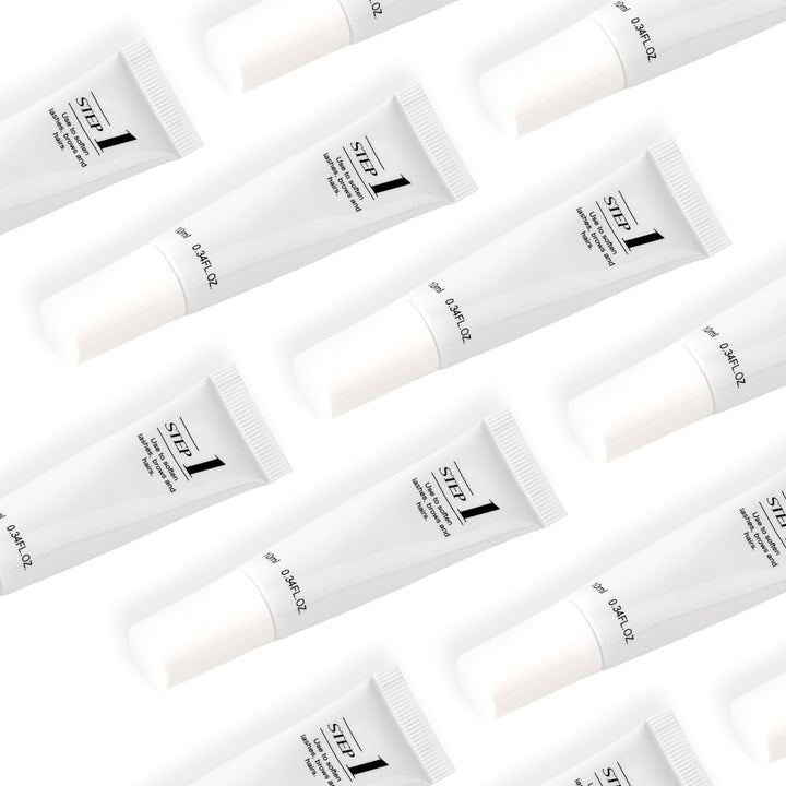 Professional lash lift treatment kit with Step 1 and Step 2 system for lifting, curling, and setting natural lashes and brows in salon use.
