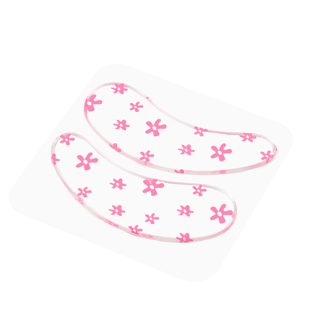 Reusable silicone eye pads. Soft medical-grade grip, easy to sanitize, protects under-eye area during lash treatments.