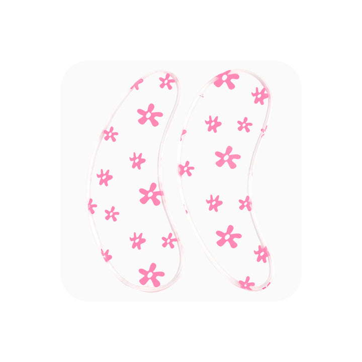 Reusable silicone eye pads. Soft medical-grade grip, easy to sanitize, protects under-eye area during lash treatments.