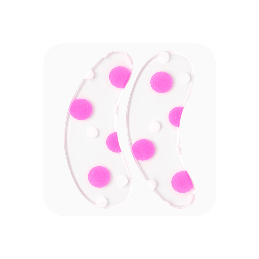 Reusable silicone eye pads. Soft medical-grade grip, easy to sanitize, protects under-eye area during lash treatments.