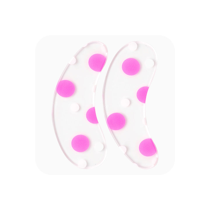 Reusable silicone eye pads. Soft medical-grade grip, easy to sanitize, protects under-eye area during lash treatments.