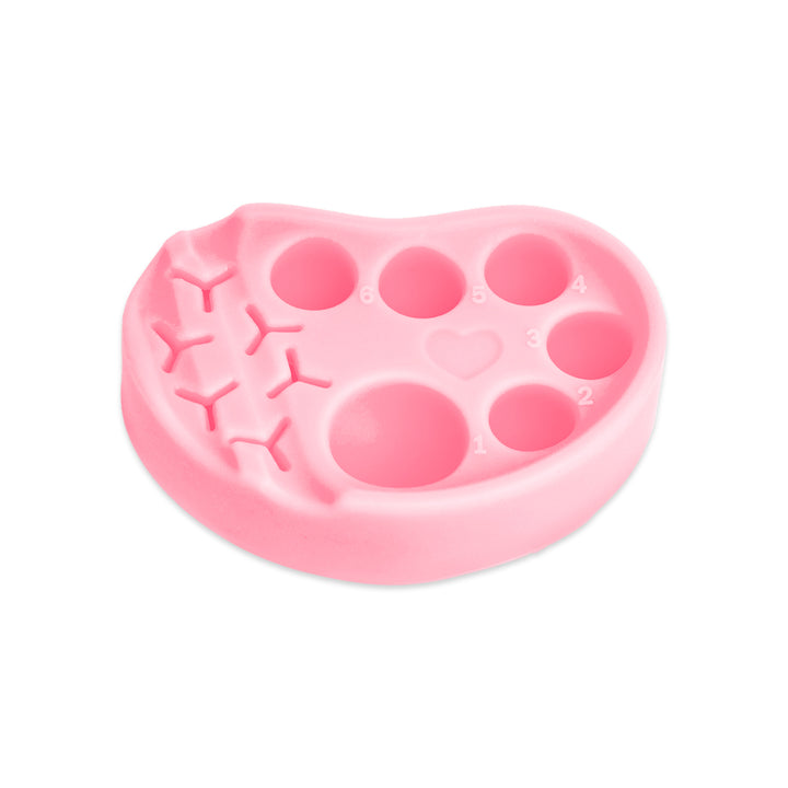 Pink and blue silicone palettes for lash lift and tint, each with six numbered wells and built-in holders for horizontal or vertical tool placement.