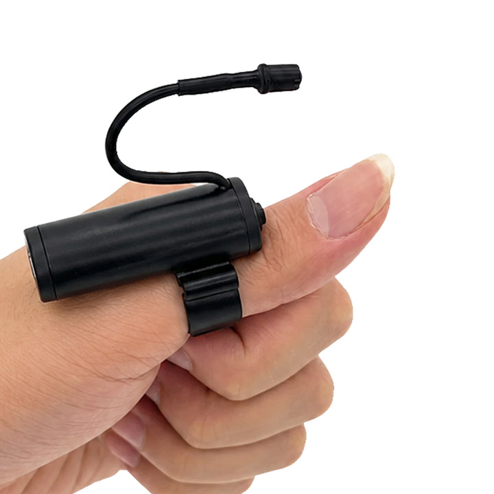 Thumb lamp for eyelash extensions with USB charging, adjustable brightness, and hands-free lighting design for professional lash artists and salon use.